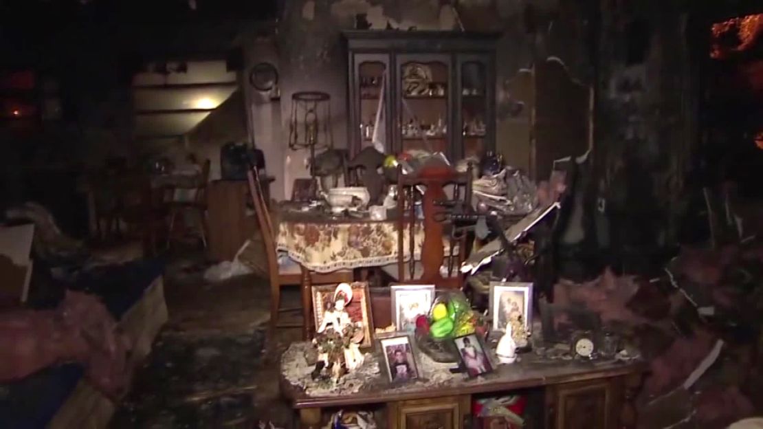 Maria Cabral's home in Miami Gardens, Florida, after it caught fire. 