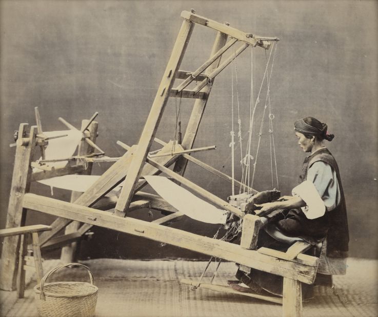 The 15,000-strong photo collection features everyday Chinese tradespeople from the time, like this weaver.