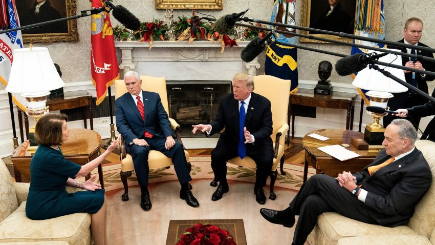 US Vice President Mike Pence (2L) and Senate Minority Leader Charles E. Schumer (D-NY) (R) listen while presumptive Speaker, House Minority Leader Nancy Pelosi (D-CA) (L), and US President Donald Trump (R) argue while making statements to the press before a meeting at the White House December 11, 2018 in Washington, DC. (Photo by Brendan Smialowski / AFP)        (Photo credit should read BRENDAN SMIALOWSKI/AFP/Getty Images)