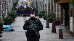 A Gendarme stands guard in the Rue des Orfevres as searches are conducted on December 12, 2018 for the gunman who opened fire near a Christmas market in Strasbourg, eastern France, the night before. - Hundreds of security forces were deployed in the hunt for a lone gunman who killed at least three people and wounded a dozen others at the famed Christmas market in Strasbourg, with the French government raising the security alert level and reinforcing border controls. (Photo by PATRICK HERTZOG / AFP)        (Photo credit should read PATRICK HERTZOG/AFP/Getty Images)