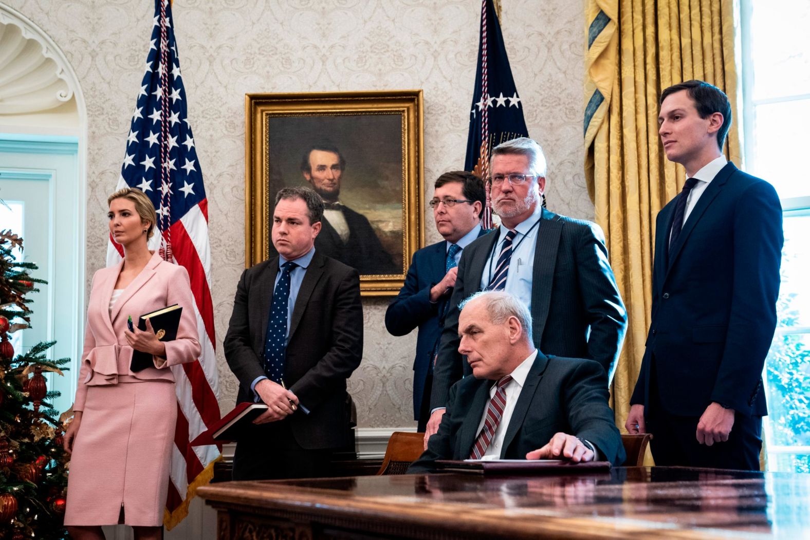 Out of view of the cameras were staffers from both sides. Here is a phalanx of White House staffers, apparently watching the exchange  with as much anticipation as those of us who saw it on TV. Note that White House communications director and former Fox News executive Bill Shine is looking at the cameras in this photo, while outgoing White House chief of staff John Kelly and presidential advisers -- and daughter and son-in-law -- Ivanka Trump and Jared Kushner are looking at the leaders. 