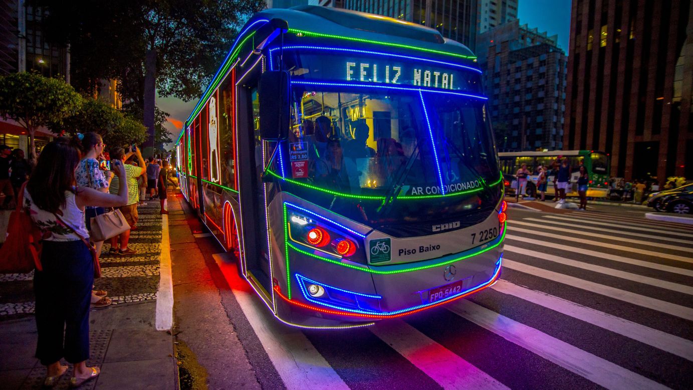 <strong>Brazil:</strong> South America's largest country is big on bold colors, and even the buses get the illuminated Christmas treatment in São Paulo. The "Feliz Natal" sign means "Merry Christmas" in Portuguese. Click through the gallery for more pictures of Christmas decor around the world: 