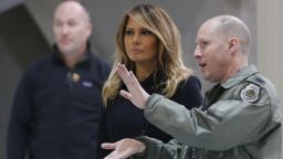 First lady Melania Trump, front left, talks with Col. Jason Hinds, Commander of the First Fighter Wing as he gives her a tour of an F22 fighter at Joint Base Langley in Hampton, Va., Wednesday, Dec. 12, 2018. (AP Photo/Steve Helber)