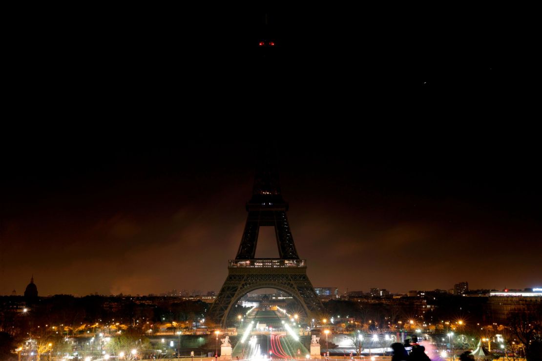 The Eiffel Tower goes dark on December 13, 2018.