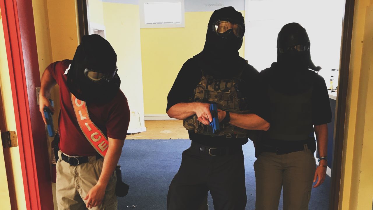 During the FBI-led training session, law enforcement uses paint bullets to simulate gunfire.