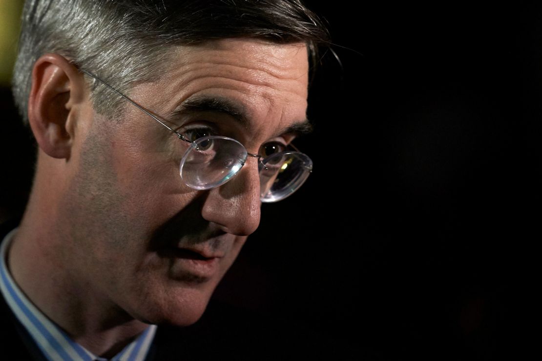 Conservative MP Jacob Rees-Mogg speaks to the media next to Parliament in central London.