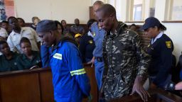 Men accused of cannibalism leave court where they face charges of murder and attempted murder in Escourt, South Africa, October 12, 2017. REUTERS/Rogan Ward

CAPTION VERIFIED FROM OTHER SOURCES Lungisani Magubane (left) and Nino Mbatha (right) face life in prison for the 2017 killing of 24-year-old Zanele Hlatshwayo. 