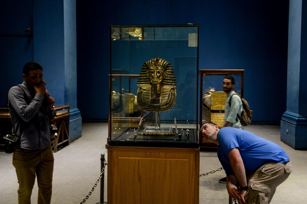 <strong>Egyptian Museum: </strong>Visitors look at the Golden Mask of King Tutankhamun at the Egyptian Museum in Cairo's Tahrir Square.