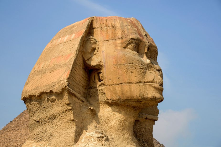 <strong>The Sphinx: </strong>The colossal limestone statue features a lion's body and a human head.