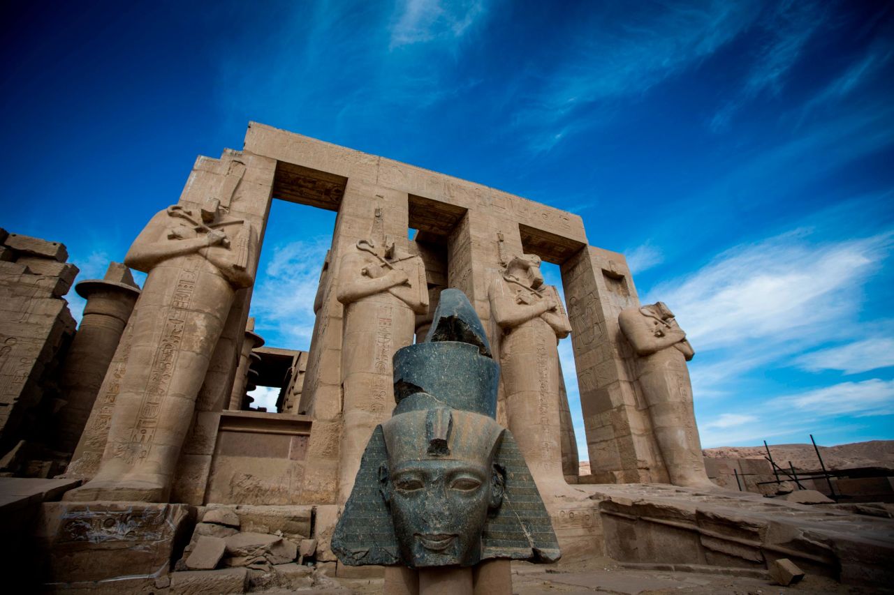<strong>Ramesseum:</strong> Colossal statues of Ramses II stand at the entrance of Ramesseum Temple, the memorial temple of Pharaoh Ramses II in Luxor.