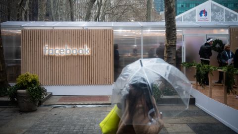 A woman passes by Facebook's first US-privacy pop-up at Bryant Park in New York on Thursday. 