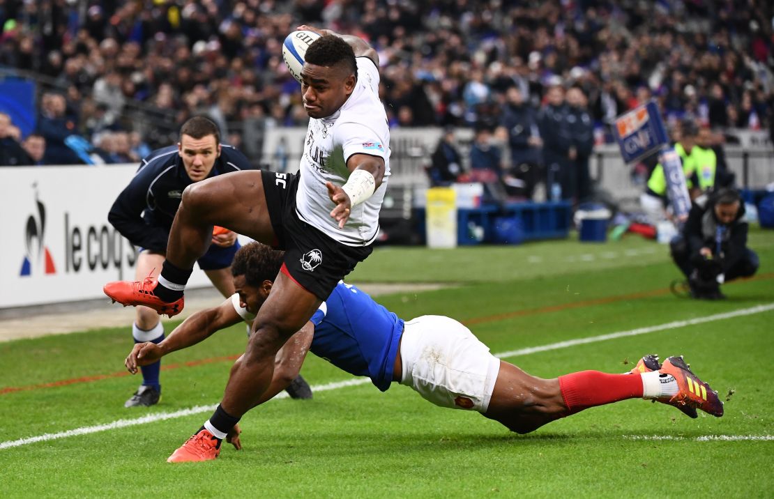 Fiji wing Josua Tuisova heads for the tryline against France.