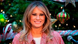 US First Lady Melania Trump reads the book "Oliver the Ornament" as she visits children at Children's National Hospital in Washington, DC, on December 13, 2018. (Photo by Jim WATSON / AFP)        (Photo credit should read JIM WATSON/AFP/Getty Images)