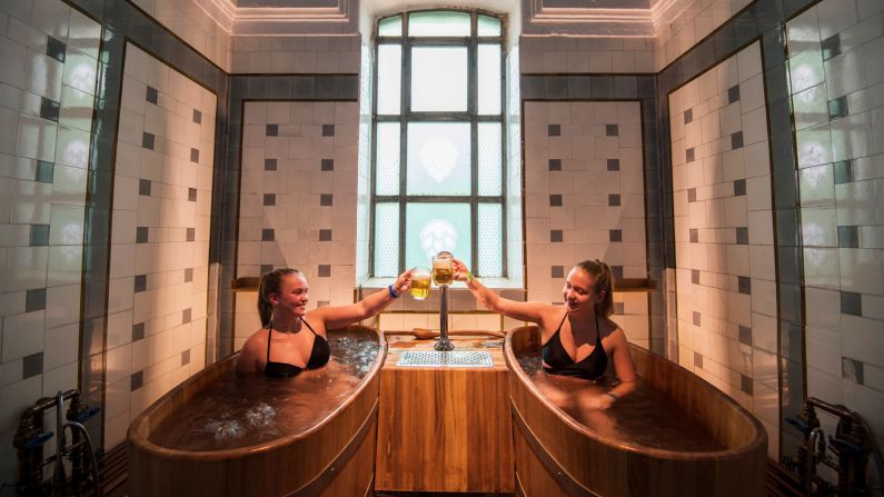 <strong>Thermal Beer Spa at Széchenyi Baths:</strong> Visitors can take a dip in a 36-degree hot water bath filled with minerals and natural extracts used for beer brewing at this quirky attraction based in the Széchenyi Baths.