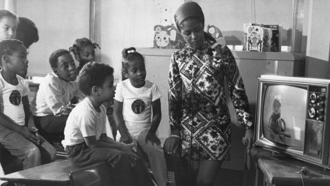 New York children in a preschool day camp watch the educational television program "Sesame Street," as part of an experiment to prepare them for public schools and sharpen academic skills for their teen instructors.