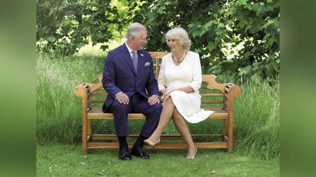 Charles and Camilla chose a verdant scene of the couple on a bench
