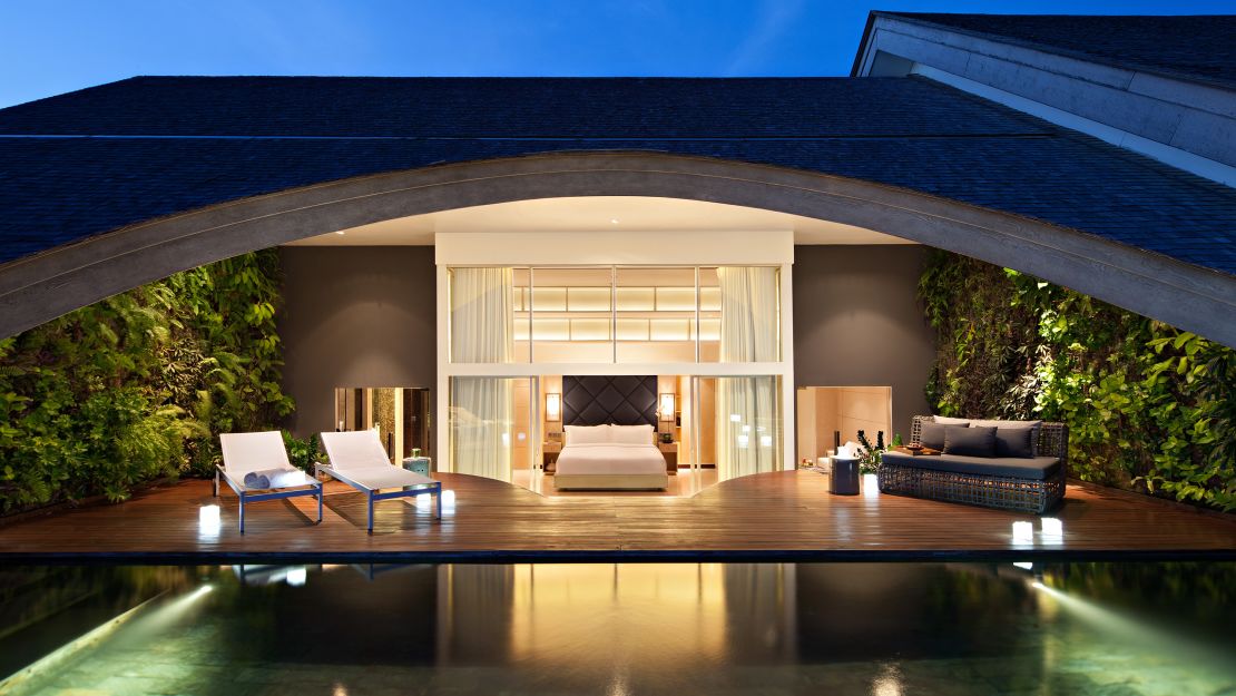 Many of the COMO Uma Canggu's rooms open up to the resort's lagoon.