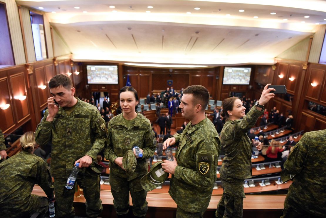 Members of the Kosovo Security Force attend the session at Kosovo parliament where lawmakers voted to create an army.