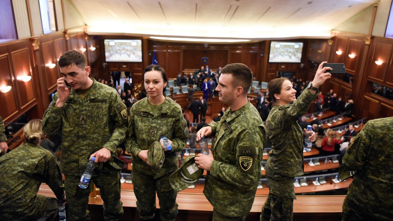Members of the Kosovo Security Force attend the session at Kosovo parliament where lawmakers voted to create an army.