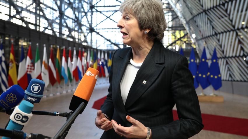 BRUSSELS, BELGIUM - DECEMBER 13: Britain's Prime Minister Theresa May speaks to the media after she arrives at the European Council for the start of the two day EU summit on December 13, 2018 in Brussels, Belgium. Mrs May yesterday won a vote of confidence in her leadership among her own MPs 200 to 117. Attending the summit she will attempt to secure greater assurances on the temporary nature of the Irish Backstop, in turn hoping to persuade MPs to vote her Brexit Deal through Parliament in the coming weeks. (Photo by Dan Kitwood/Getty Images)