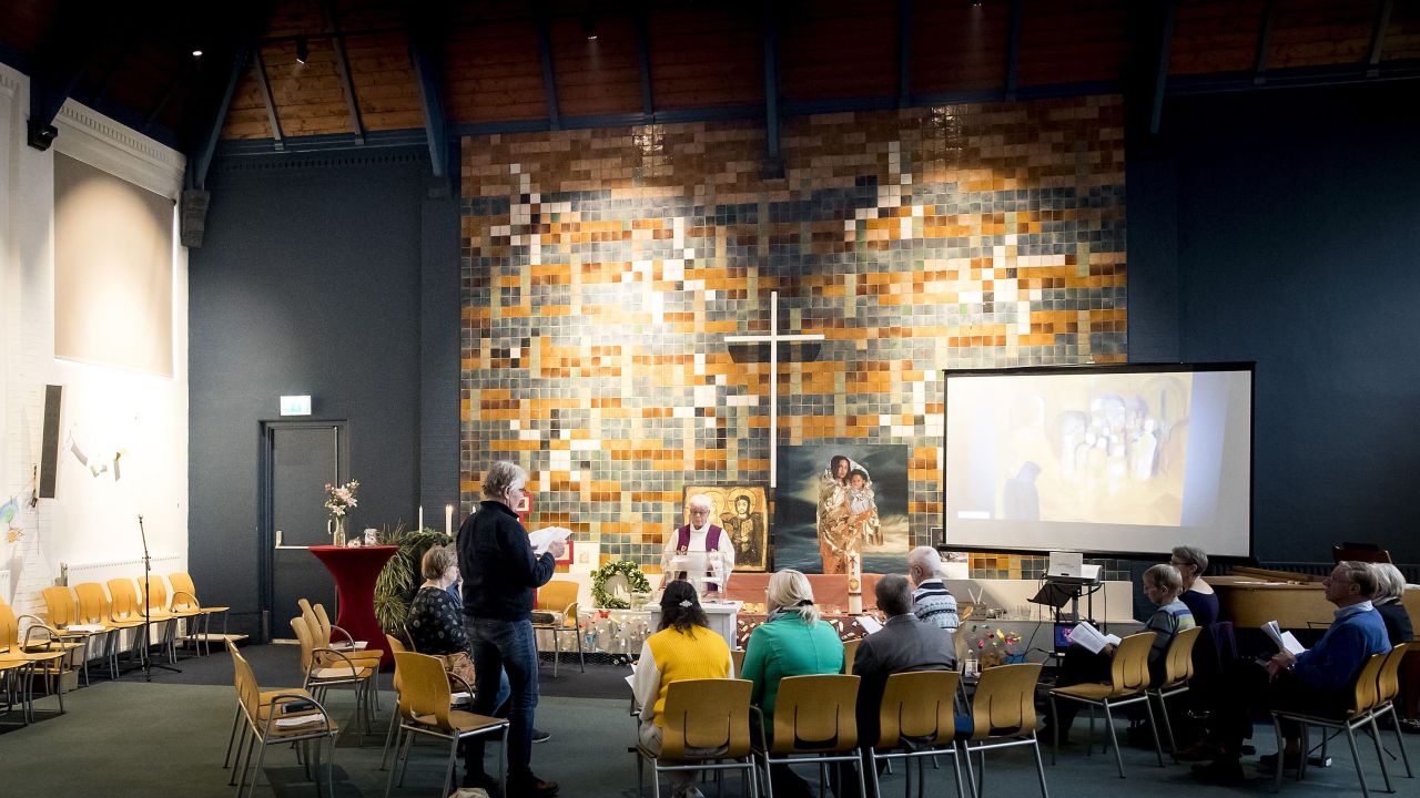 Hayarpi Tamrazyan (C) from Armenia attends a service in the Bethel church as it holds round-the-clock religious services to prevent the family from being deported.