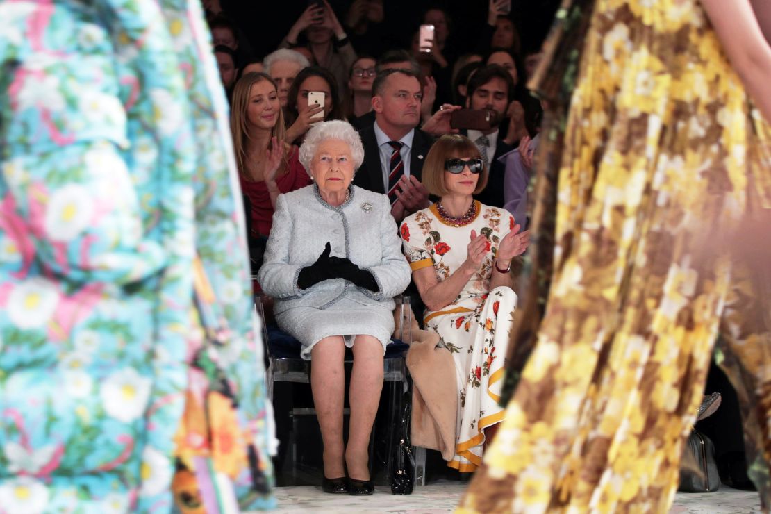 Queen Elizabeth II (sat here with Vogue editor Anna Wintour) attended Richard Quinn's runway show in February before presenting him with the inaugural Queen Elizabeth II Award for British Design.
