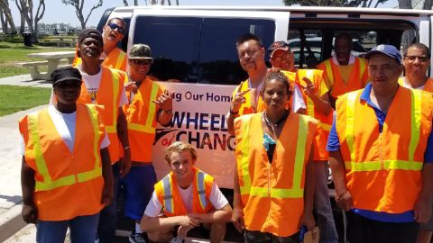 San Diego teen Kevin Barber (center) poses with his "Wheels of Change" crew.