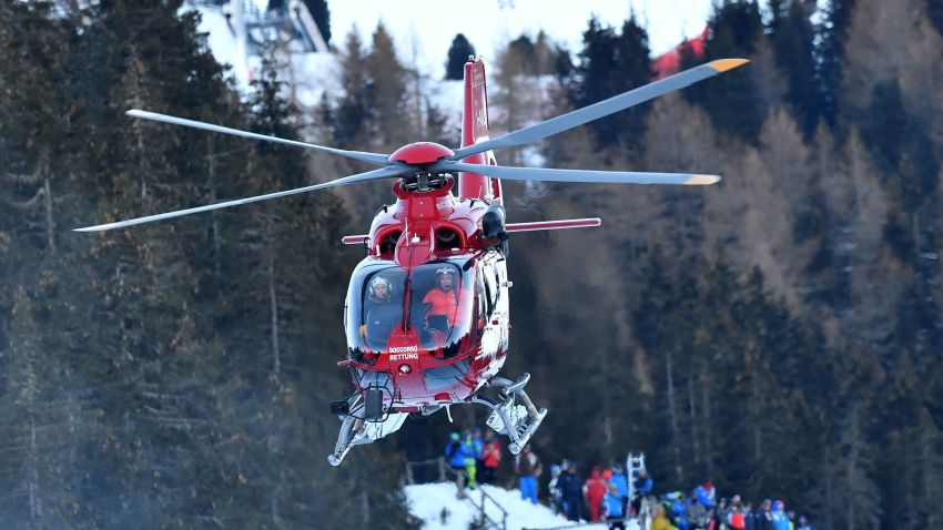 A rescue helicopter transports Switzerland's Marc Gisin to hospital after his horror crash in the World Cup men's downhill at Val Gardena.