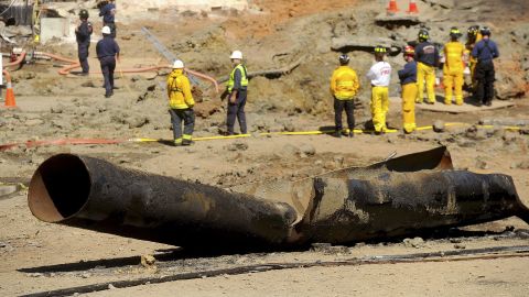 A natural gas line lies broken on a San Bruno, California, road after a massive explosion September 11, 2010. PG&E was placed on probation and given massive fines related to the blast.