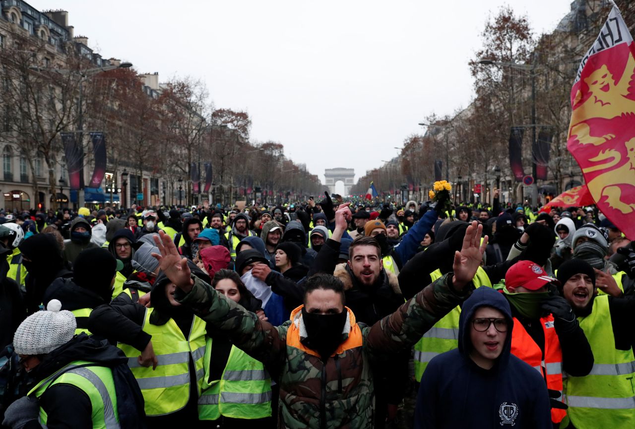 Protesters take part in a demonstration on December 15 in Paris.