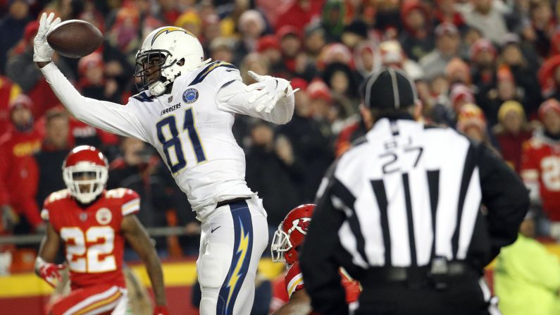 Kansas City Chiefs cornerback Kendall Fuller, lower right, is called for pass interference against Los Angeles Chargers wide receiver Mike Williams during the second half of the game in Kansas City on Thursday, December 13.