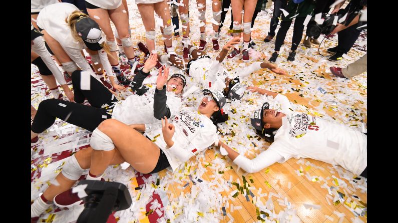 Stanford players celebrate with confetti after winning the Division I Women's Volleyball Championship on December 15 in Minneapolis, Minnesota. Stanford won the championship match in five sets over Nebraska.