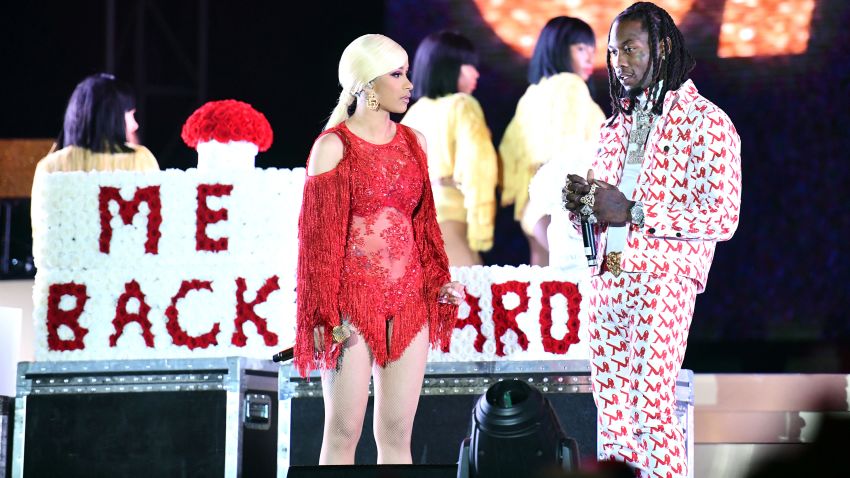 LOS ANGELES, CALIFORNIA - DECEMBER 15: Singer Cardi B is presented a 'Take Me Back' card onstage by Offset during day 2 of the Rolling Loud Festival at Banc of California Stadium on December 15, 2018 in Los Angeles, California. (Photo by Scott Dudelson/Getty Images)