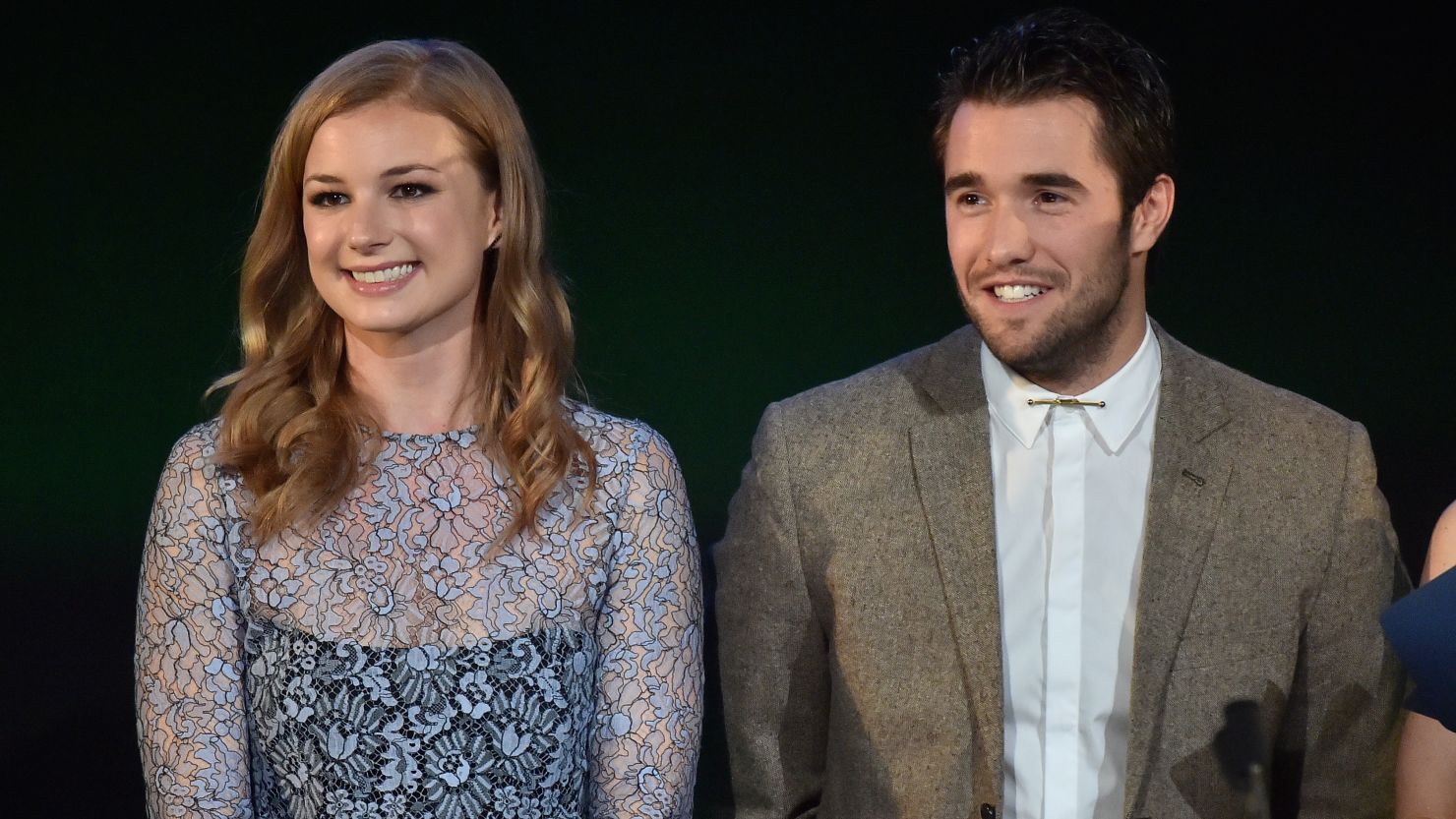 Actors Emily VanCamp (L) and Joshua Bowman speak at the 24th Annual Environmental Media Awards presented by Toyota and Lexus at Warner Bros. Studio on October 18, 2014 in Burbank, California.  