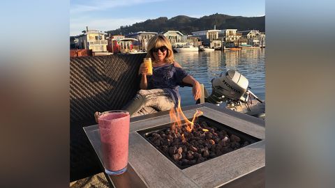 Michele Affronte, a real estate agent in Sausalito, outside her floating home.