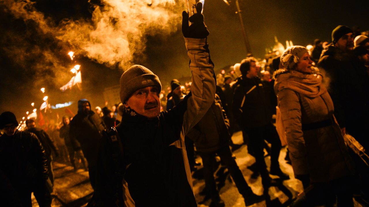 BUDAPEST, HUNGARY - 2018/12/16: A protester seen holding a burning flare during the protest against the new labour law approved by the right wing conservative government lead by Viktor Orban.
The Hungarian government has passed a set of controversial laws on judicial and labour topics, The new labour law, known as "slave law" allows employers to ask their workers to take on up to 400 hours' overtime per year. (Photo by Omar Marques/SOPA Images/LightRocket via Getty Images)