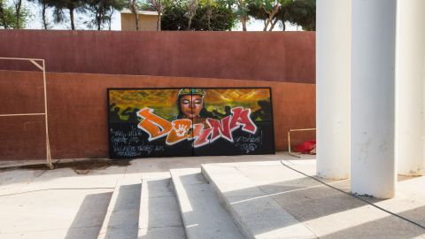 A sign with the word "Doyna," or "that's enough" in Wolof, is seen behind the Henriett-Bathily Women's Museum in Dakar.