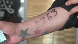 Some of the asylum-seekers on the US-Mexico border had numbers written in black ink on their arms.