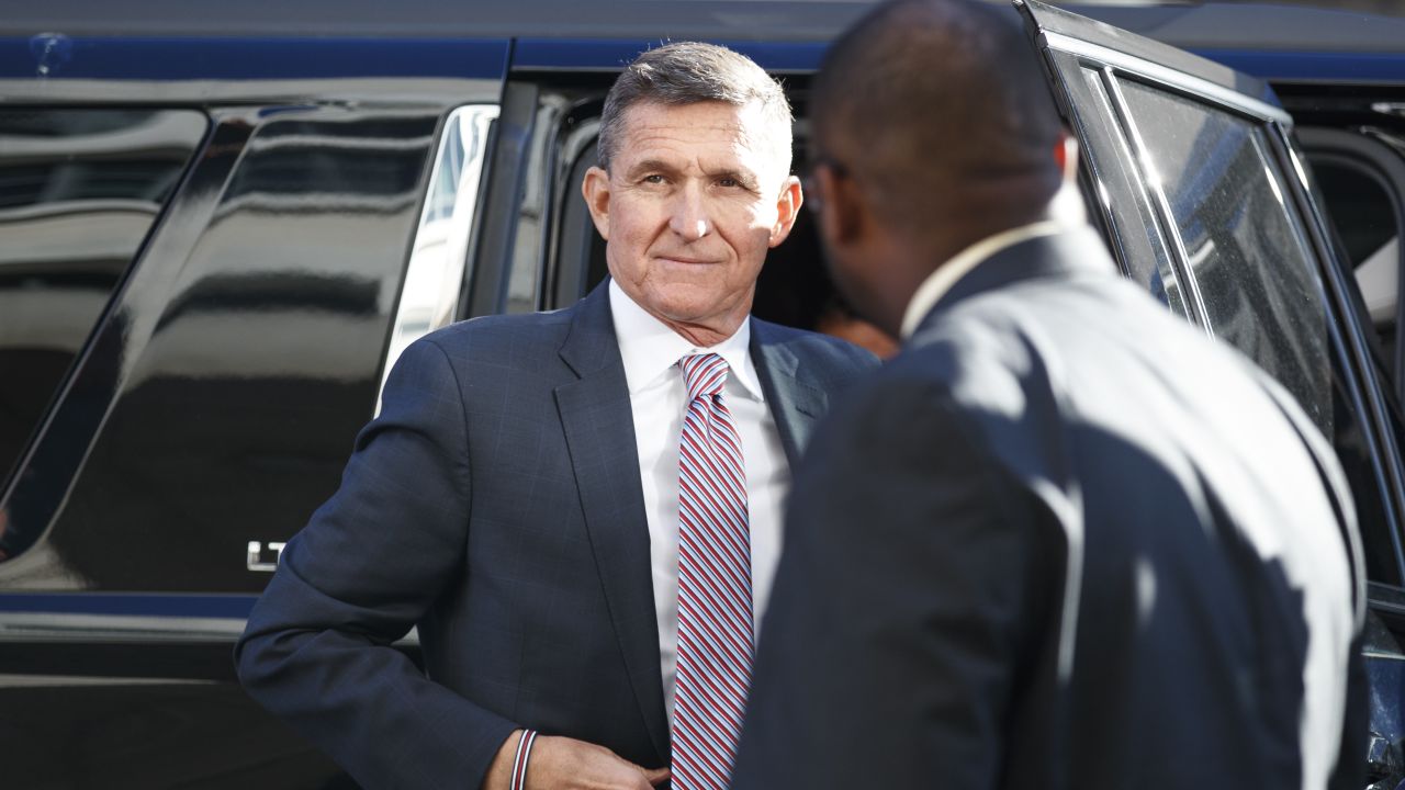 President Donald Trump's former National Security Advisor Michael Flynn arrives at federal court in Washington, Tuesday, Dec. 18, 2018. (AP Photo/Carolyn Kaster)