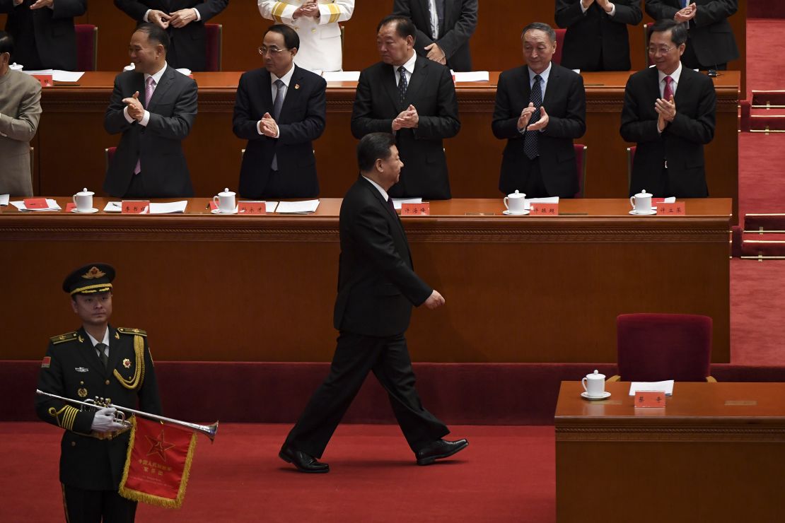 China's President Xi Jinping arrives for a celebration marking the 40th anniversary of China's Reform and Opening at the Great Hall of the People in Beijing on December 18.