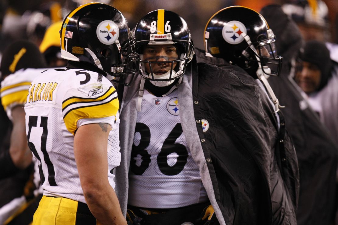 Hines Ward and James Farrior of the Pittsburgh Steelers stand on the sideline during a loss to the Cleveland Browns in 2009. The loss helped give the AFC North to the Baltimore Ravens and keep the defending Super Bowl champion Steelers out of the playoffs.  
