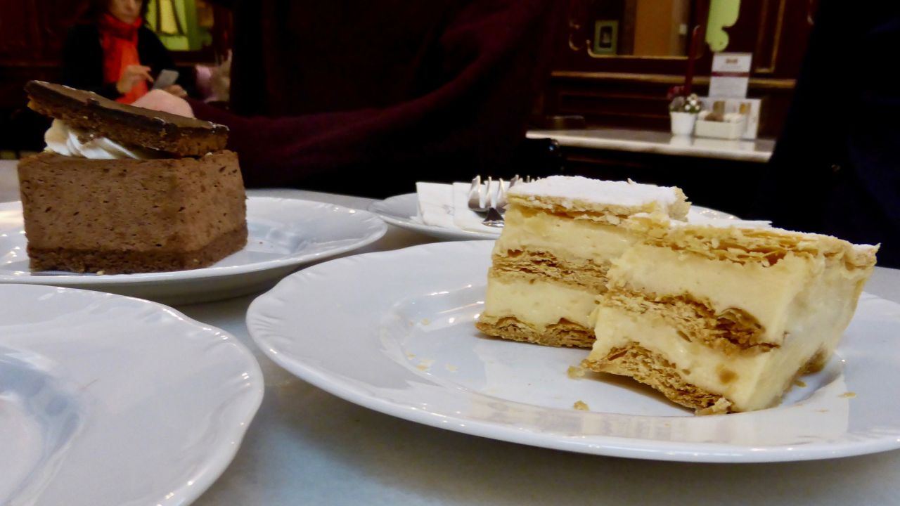<strong>Rigó Jancsi and krémes:</strong> Soft chocolate sponge is teamed with apricot jam and velvety chocolate mousse for the delicious Rigó Jancsi, left. Krémes, right, is another must-eat dessert thanks to its wonderful creamy texture.