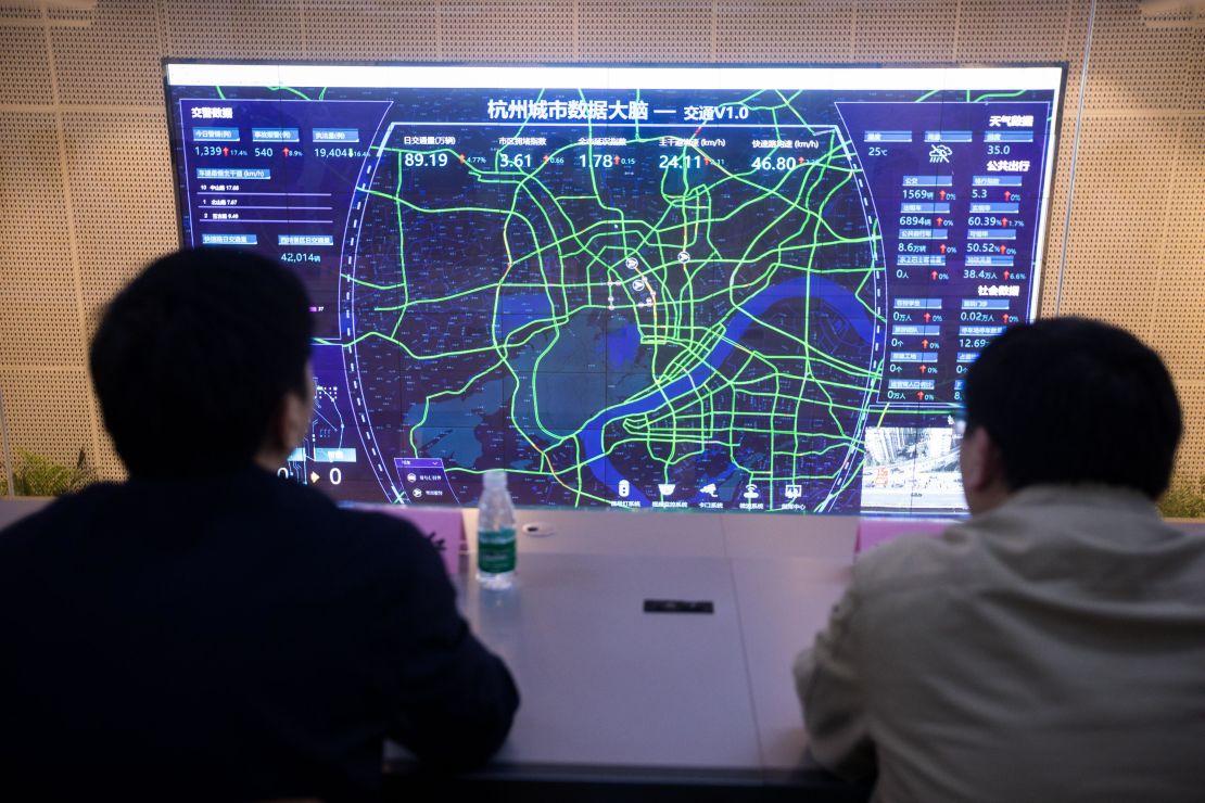 Alibaba says its AI-driven "City Brain" project in Hangzhou has improved traffic.
