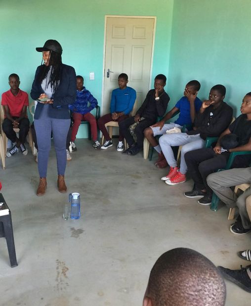 A community member, Lebogang Mashishi, gives a talk to young boys about how to respect women during a meeting in Pankop, Mpumalanaga province in South Africa. Groups across the country such as Young Men's Movement and the global ManKind Project are seeking to support men through life and to actively mobilize them in fighting violence against women.