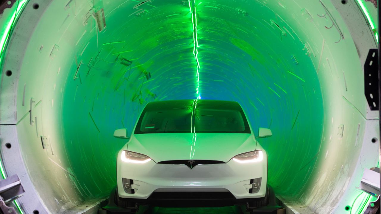 A Tesla sits at an entrance to the Boring Company's test tunnel.
