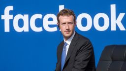 Mark Zuckerberg, chief executive officer of Facebook Inc., listens as Narendra Modi, India's prime minister, not pictured, speaks during a town hall meeting at Facebook headquarters in Menlo Park, California, U.S., on Sunday, Sept. 27, 2015. Prime Minister Modi plans on connecting 600,000 villages across India using fiber optic cable as part of his "dream" to expand the world's largest democracy's economy to $20 trillion. Photographer: David Paul Morris/Bloomberg via Getty Images 