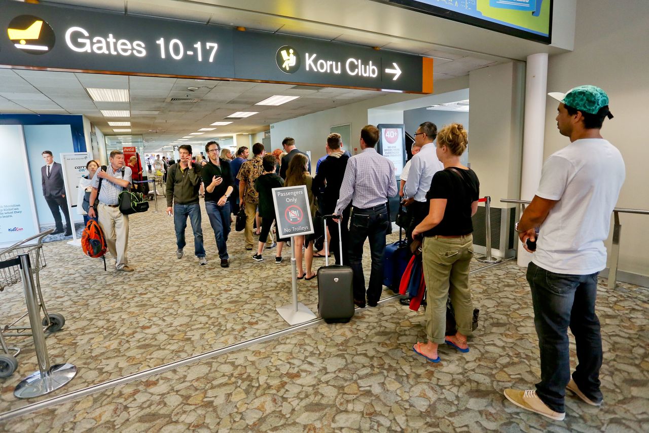  Passengers queue up at departure gates at Wellington Airport in Wellington, New Zealand. 
