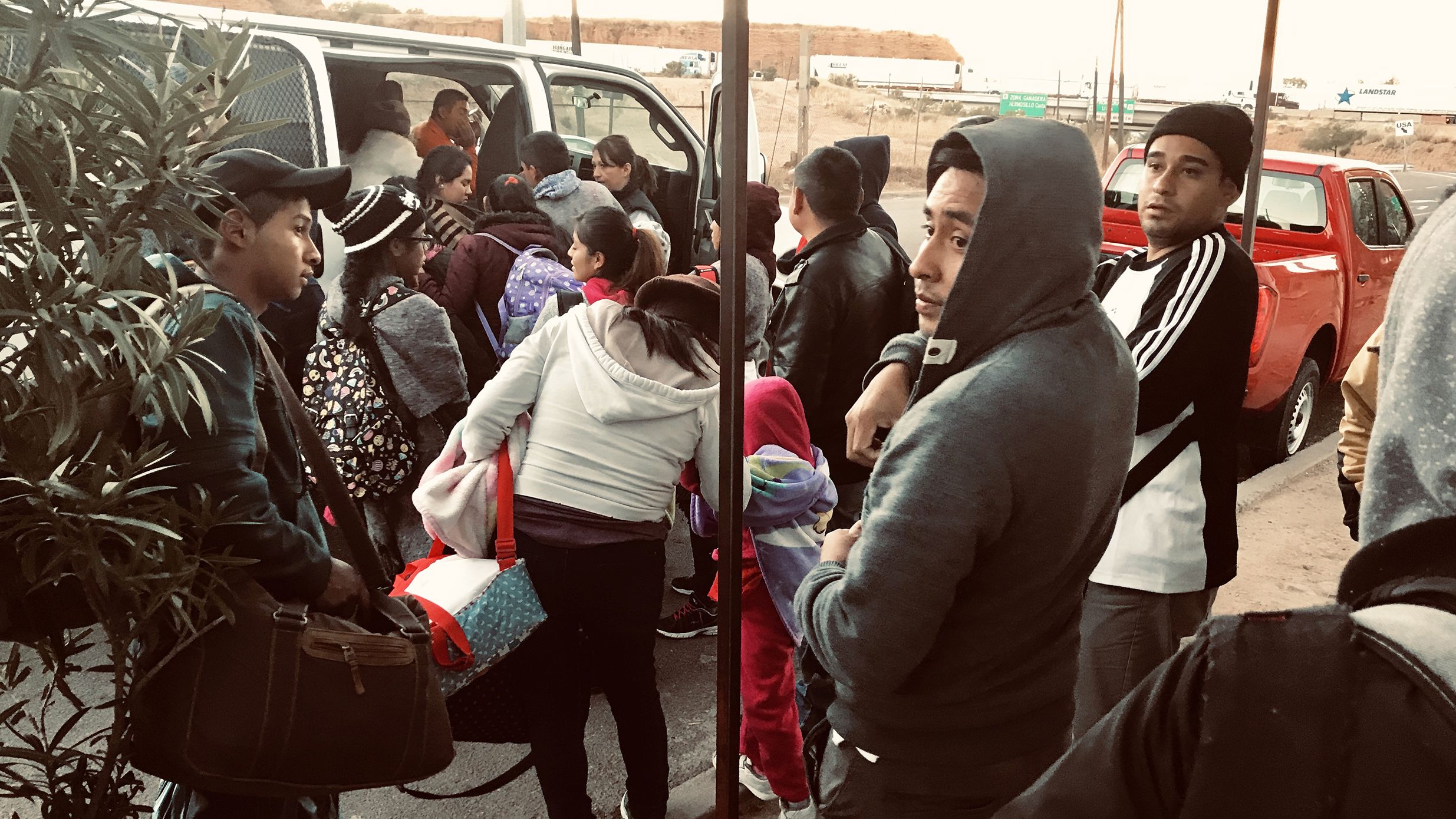 Asylum seekers boarded a van to a migrant shelter in Nogales on the Mexican side of the border. They had been waiting from a day to two weeks to apply for asylum at the US port of entry in Nogales, Arizona.
