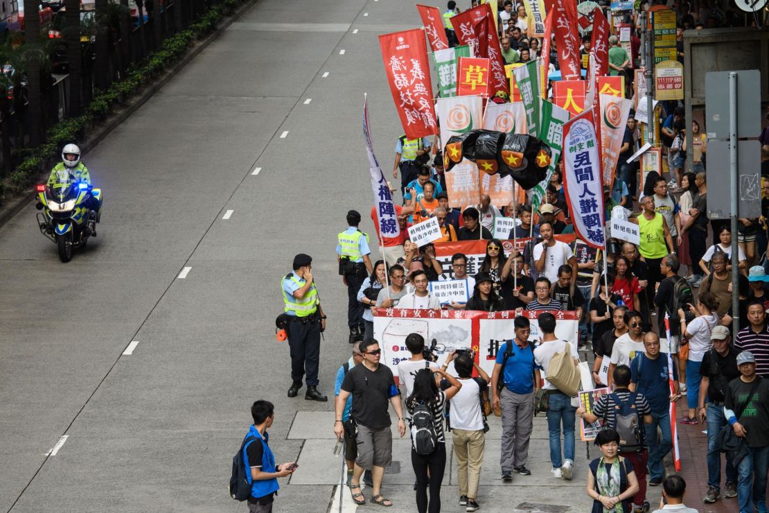 Protestors take part in a National Day pro-democracy rally in Hong Kong on October 1, 2018.