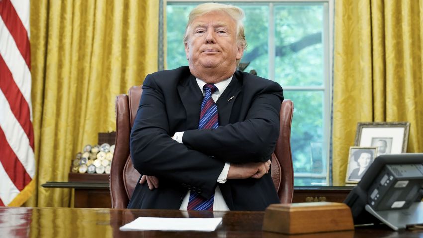 US President Donald Trump speaks to reporters after a phone conversation with Mexico's President Enrique Pena Nieto on trade in the Oval Office of the White House in Washington, DC on August 27, 2018. - President Donald Trump said Monday the US had reached a "really good deal" with Mexico and talks with Canada would begin shortly on a new regional free trade pact."It's a big day for trade. It's a really good deal for both countries," Trump said."Canada, we will start negotiations shortly. I'll be calling their prime minister very soon," Trump said.US and Mexican negotiators have been working for weeks to iron out differences in order to revise the nearly 25-year old North American Free Trade Agreement, while Canada was waiting to rejoin the negotiations. (Photo by MANDEL NGAN / AFP) (Photo credit should read MANDEL NGAN/AFP/Getty Images)